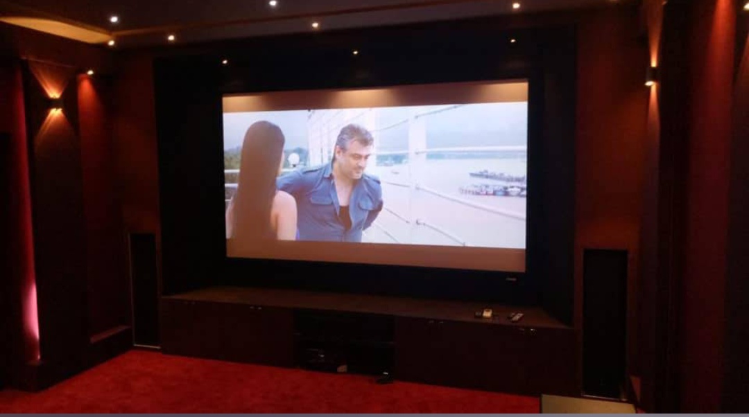 Premium home theatre room with LED ambient lighting installed by YHWH VISION in Sangli